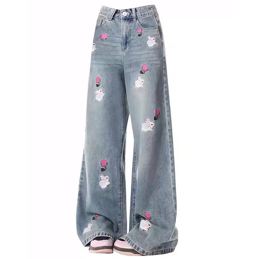 Jeans con ricamo rosa e coniglietto